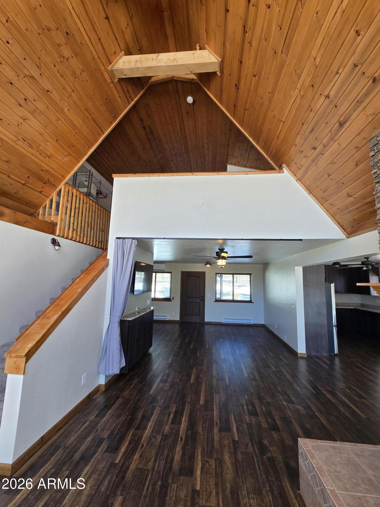 2795 Coyote Ridge Happy Jack, AZ 86024 - Photo 8 of 31 a view of entryway and hall with wooden floor