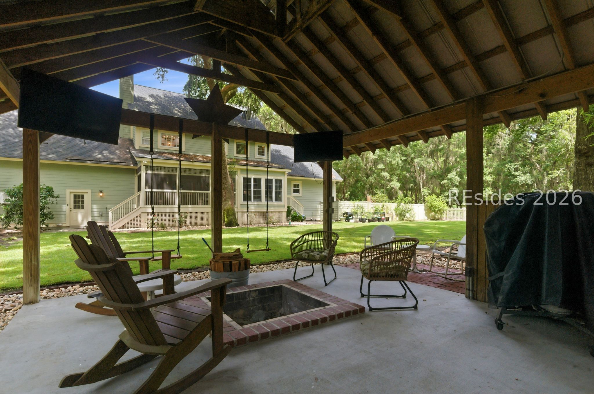 70 Foreman Hill Road Bluffton, SC 29910 - Photo 49 of 53 Pergola and fire pit overlooking back yard