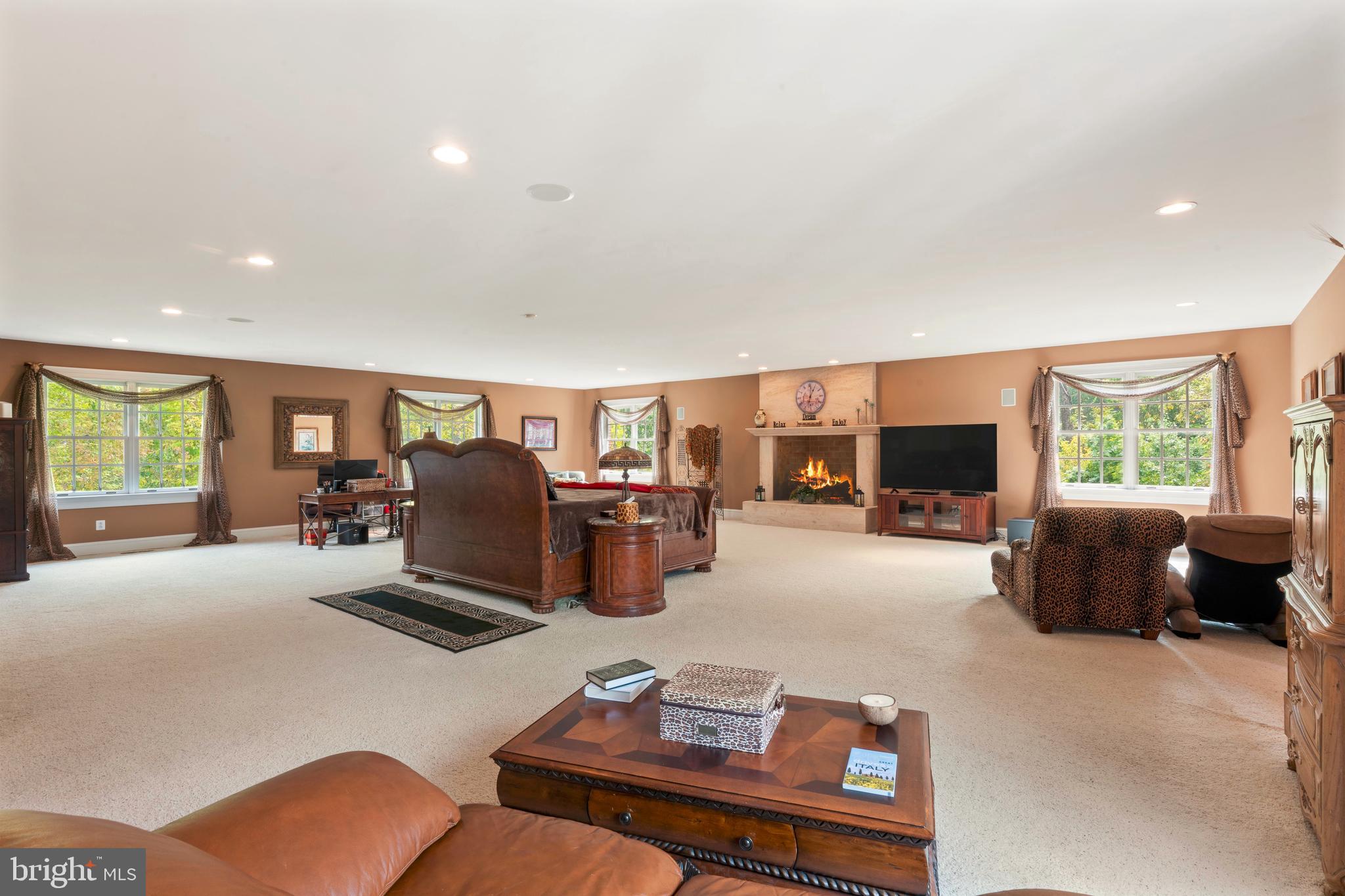 1390 Old Jacksonville Road Ivyland, PA 18974 - Photo 44 of 69 a living room with furniture a flat screen tv and a large window