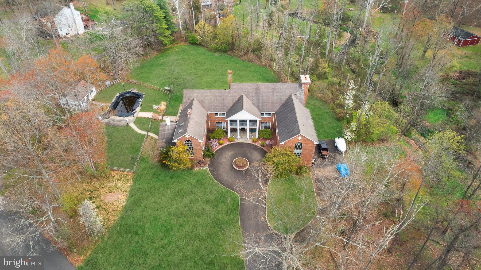 1390 Old Jacksonville Road Ivyland, PA 18974 - Photo 69 of 69 an aerial view of a house with a garden and trees