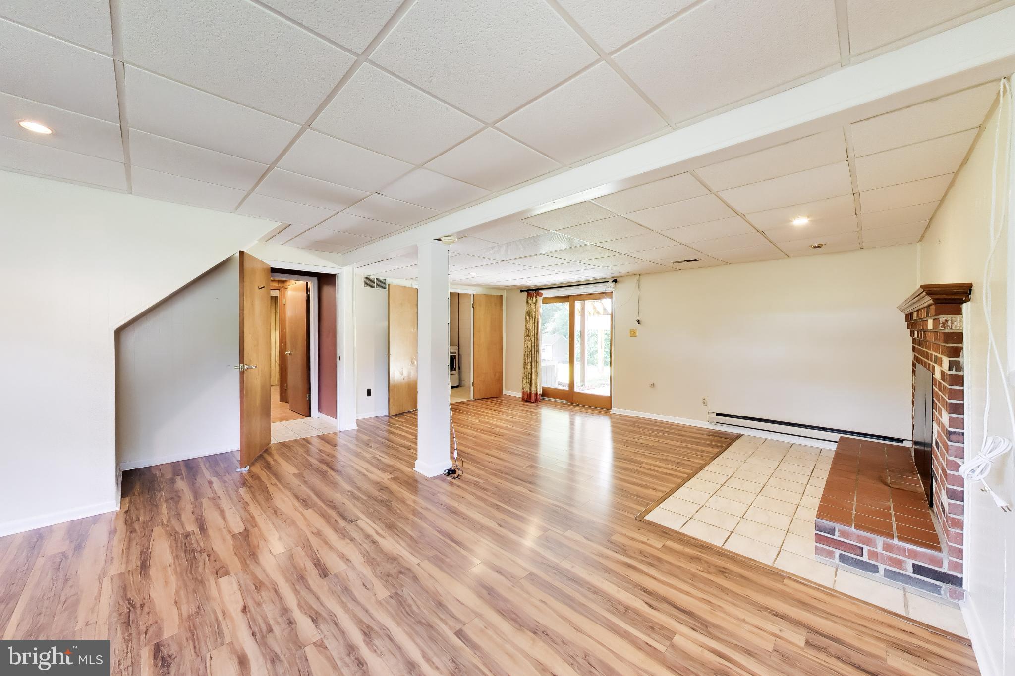 30075 Huntt Road Mechanicsville, MD 20659 - Photo 30 of 45 Recreation Rm with LVP Flooring & Recessed Lights