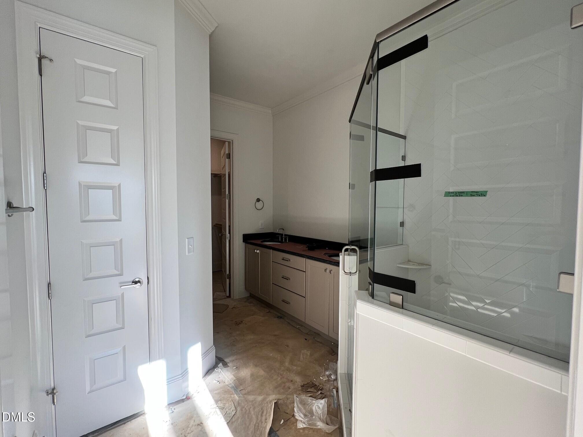 1007 Coldspring Circle Durham, NC 27705 - Photo 12 of 66 a kitchen with a sink and a refrigerator