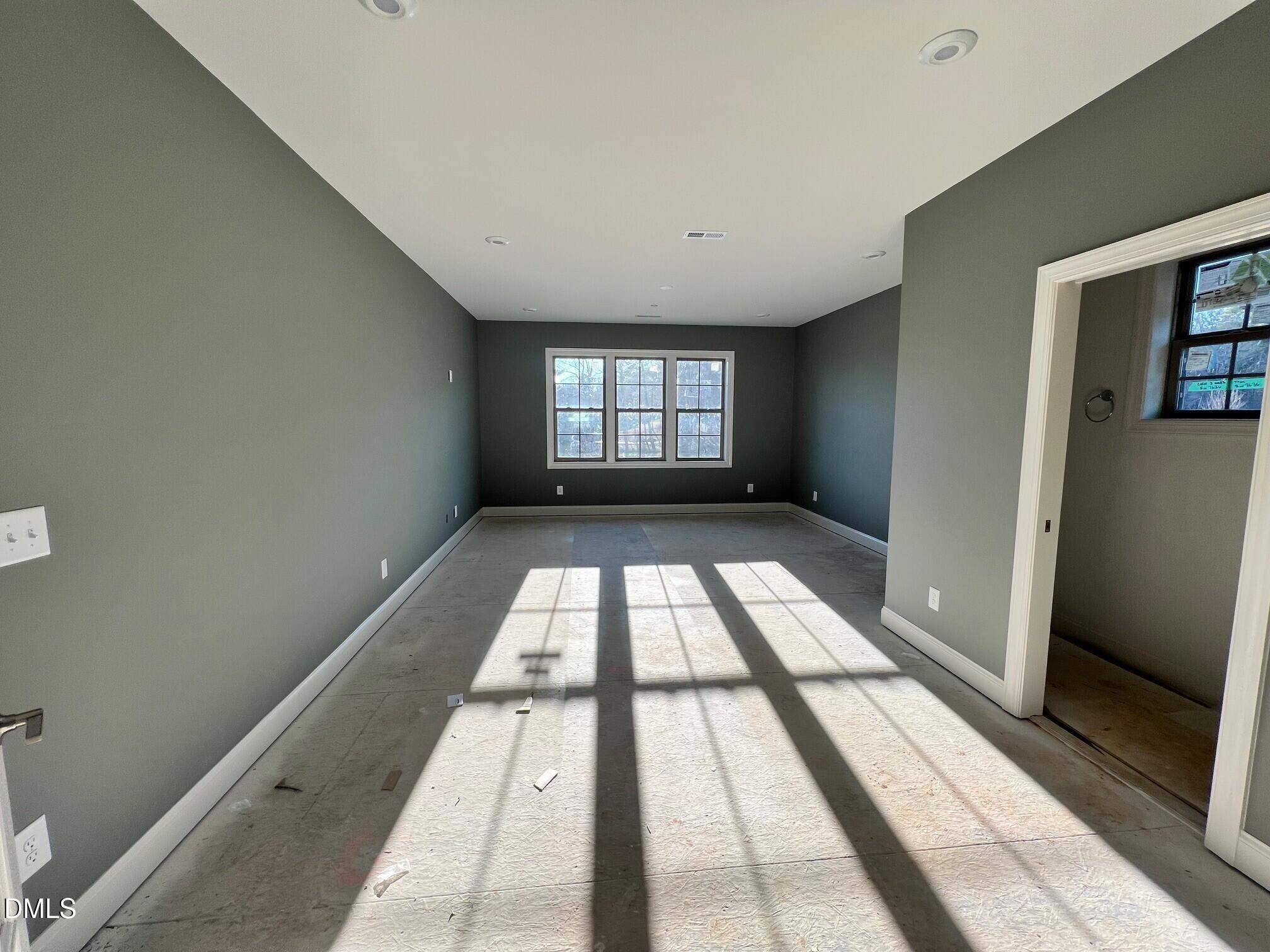 1007 Coldspring Circle Durham, NC 27705 - Photo 15 of 66 a view of a room with windows