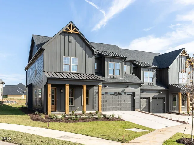 a bathroom with a sink a mirror and a window