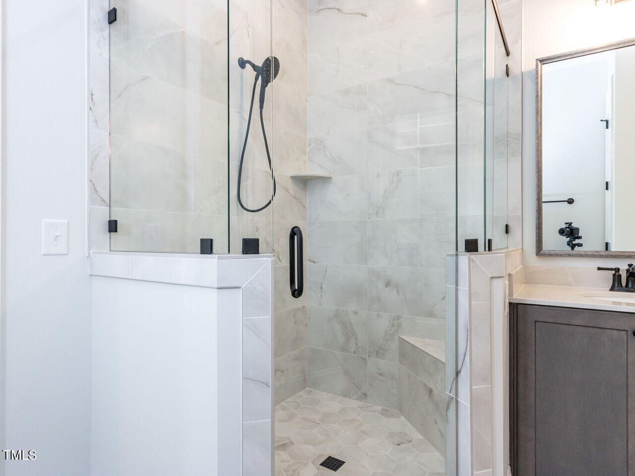 1007 Coldspring Circle Durham, NC 27705 - Photo 52 of 66 a bathroom with a shower and a sink