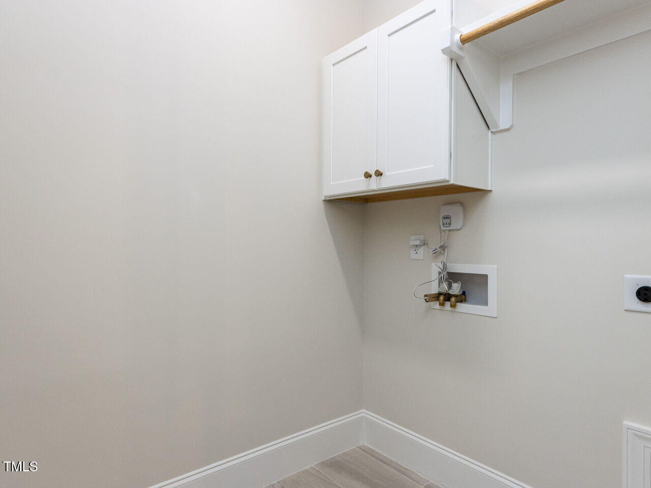 1007 Coldspring Circle Durham, NC 27705 - Photo 54 of 66 a view of a room with rack on the wall