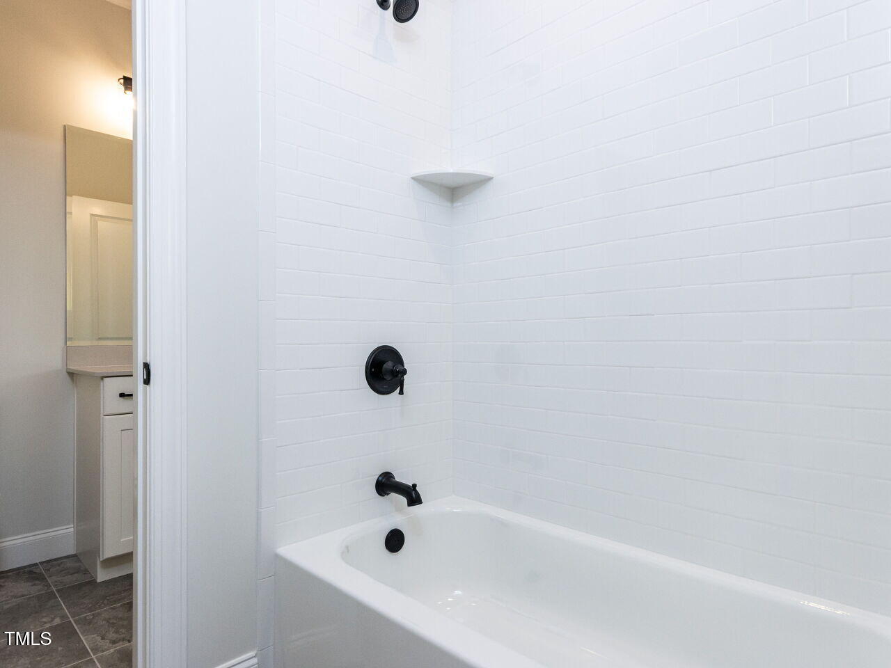 1007 Coldspring Circle Durham, NC 27705 - Photo 62 of 66 a bathroom with a bathtub