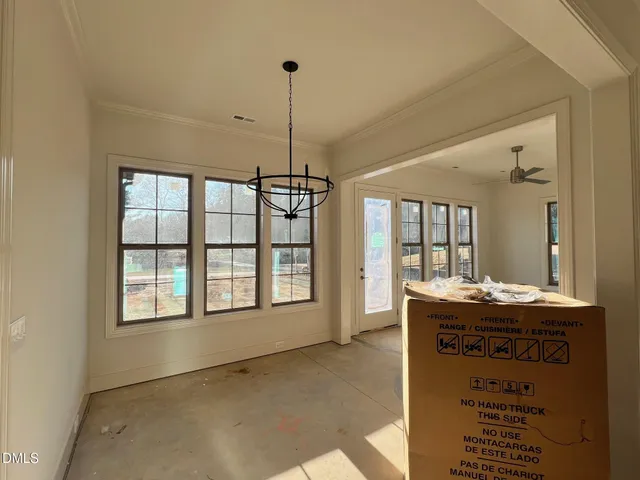 a black and white photo of a living room