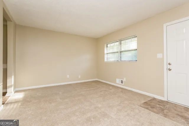 an empty room with windows