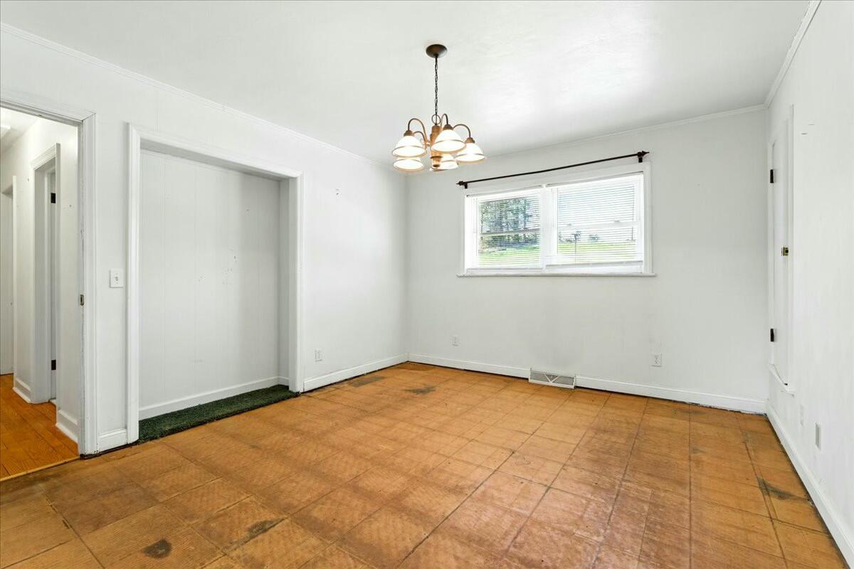 2351 Reese Mountain Road Elliston, VA 24087 - Photo 14 of 57 a view of an empty room with a window