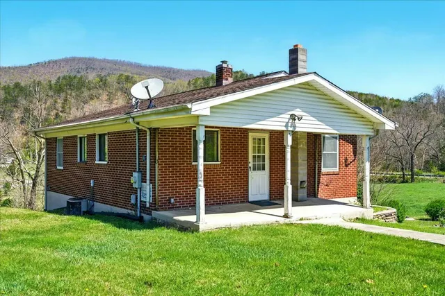 a kitchen with a refrigerator a sink and a stove