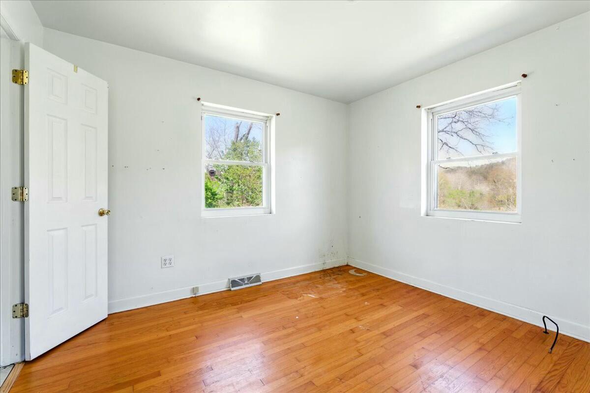 2351 Reese Mountain Road Elliston, VA 24087 - Photo 41 of 57 a view of an empty room with a window