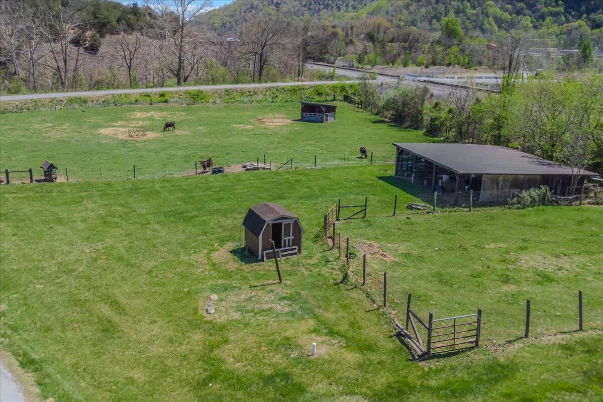 2351 Reese Mountain Road Elliston, VA 24087 - Photo 50 of 57 a view of a house with a yard