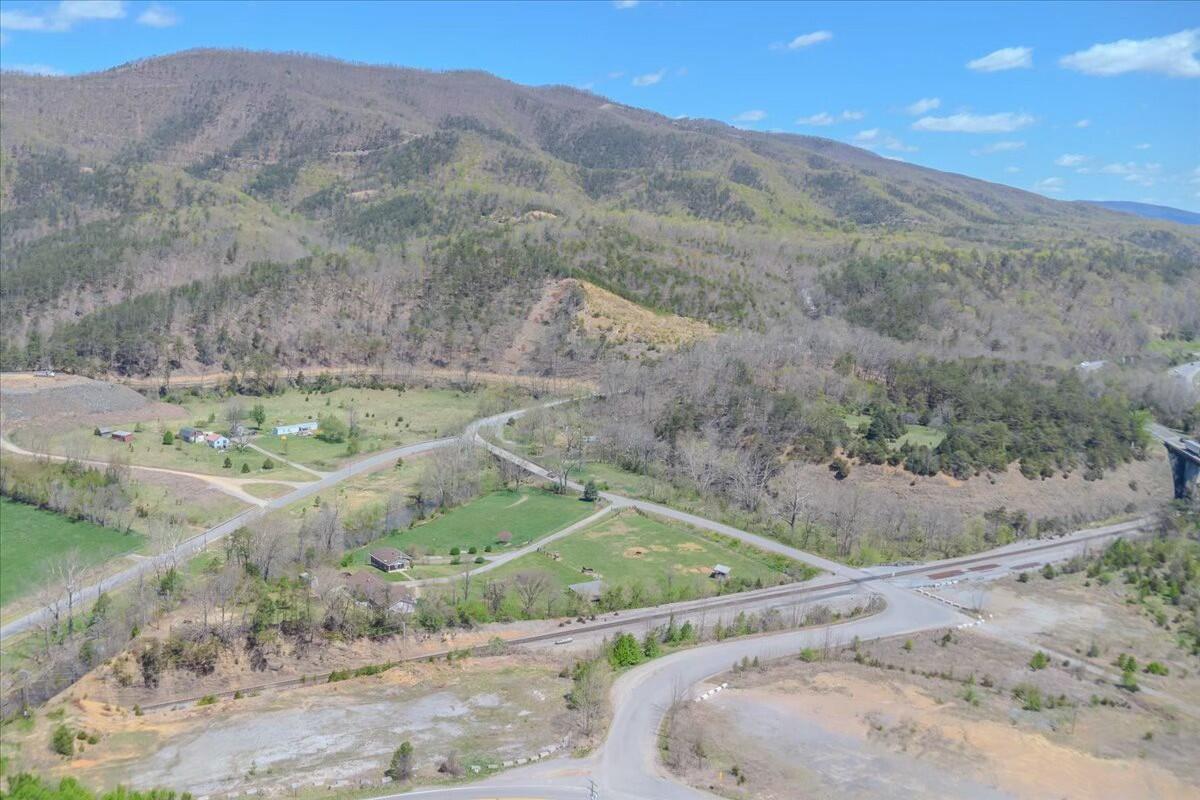 2351 Reese Mountain Road Elliston, VA 24087 - Photo 56 of 57 a view of a dry yard with mountain