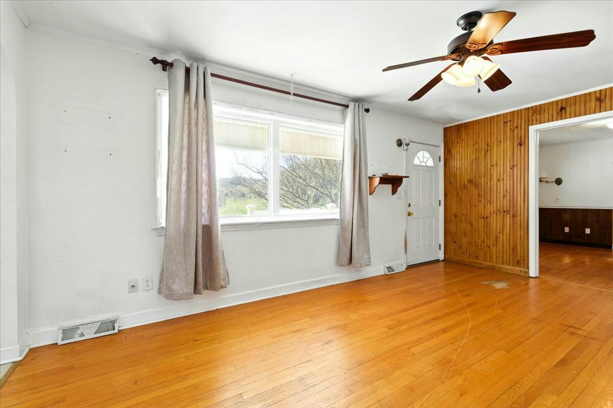 2351 Reese Mountain Road Elliston, VA 24087 - Photo 9 of 57 a view of an empty room with a window