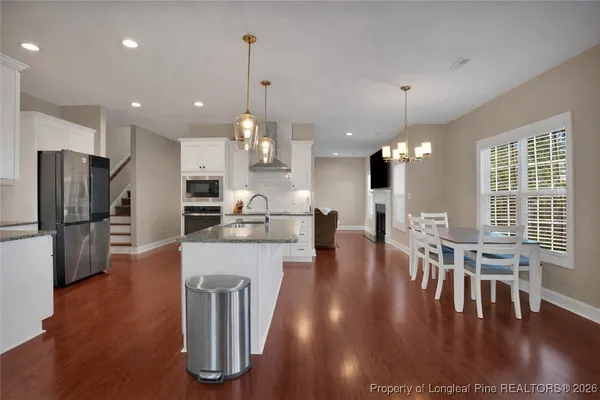 a bathroom with a tub and shower