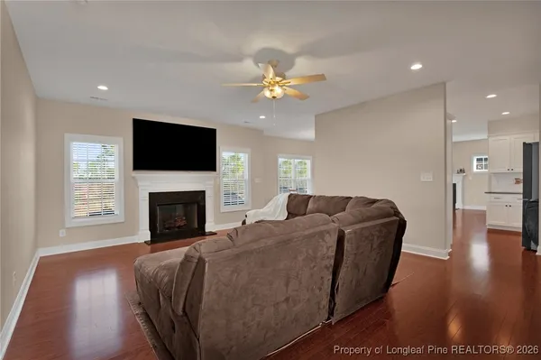 a kitchen with stainless steel appliances granite countertop a stove and a microwave