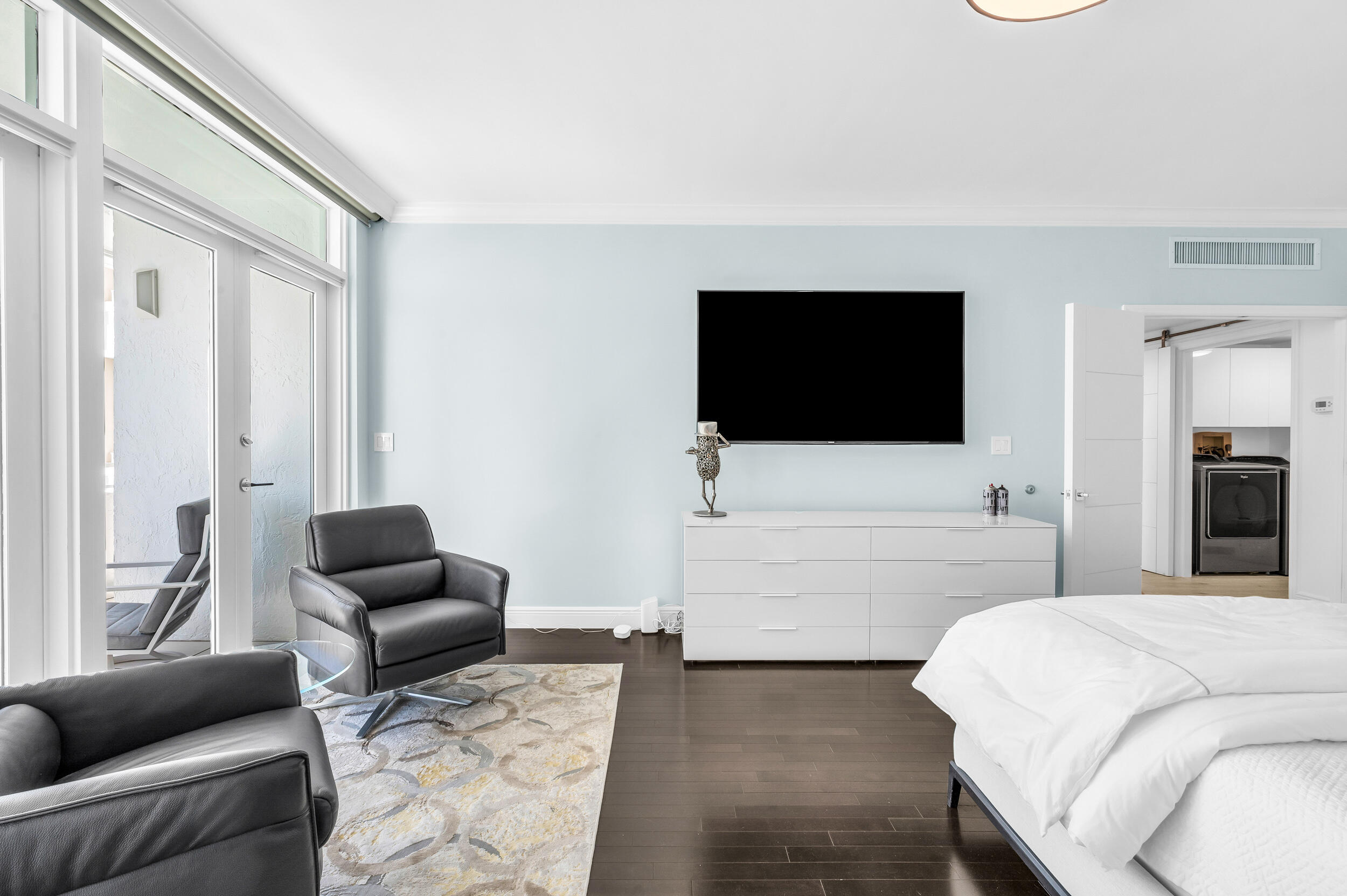 300 Southeast 5th Avenue, Unit 6110 Boca Raton, FL 33432 - Photo 22 of 96 a living room with furniture and a flat screen tv