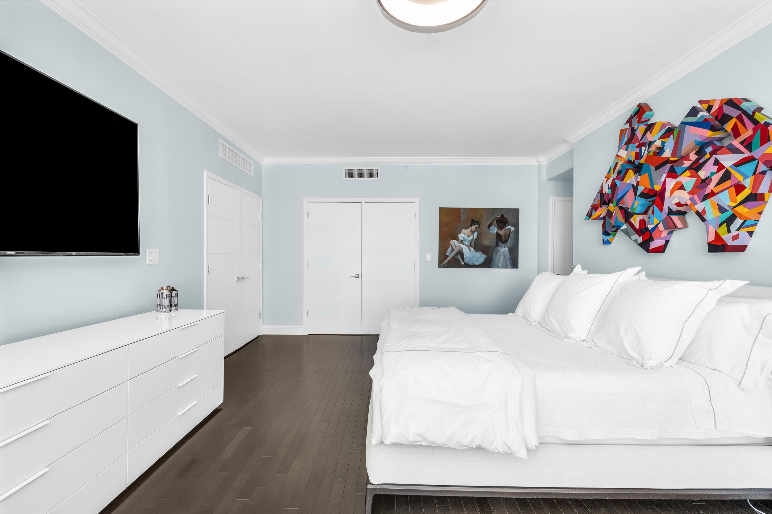 300 Southeast 5th Avenue, Unit 6110 Boca Raton, FL 33432 - Photo 23 of 96 a bedroom with a bed and a flat screen tv