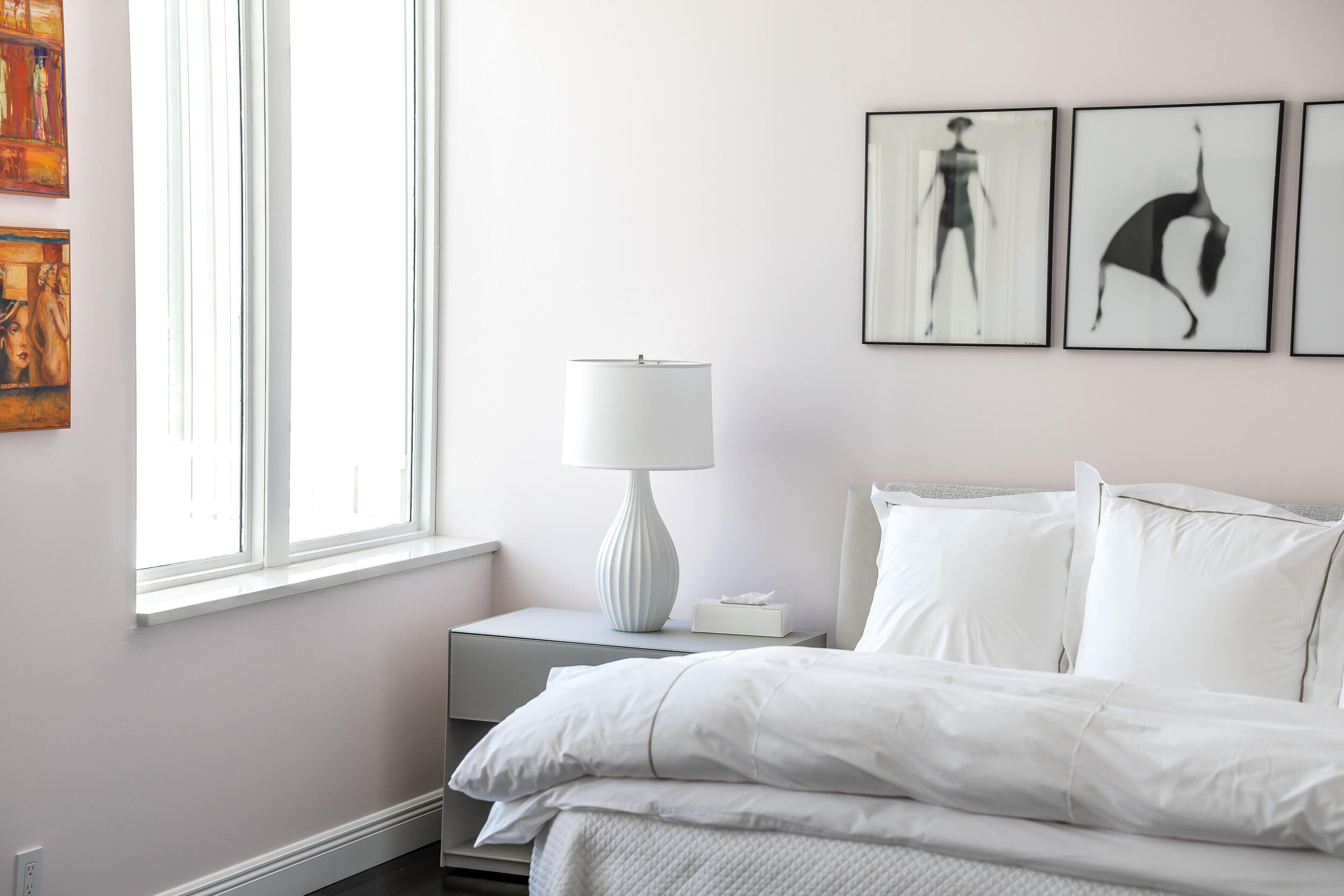 300 Southeast 5th Avenue, Unit 6110 Boca Raton, FL 33432 - Photo 35 of 96 a bedroom with a bed and a painting on the wall