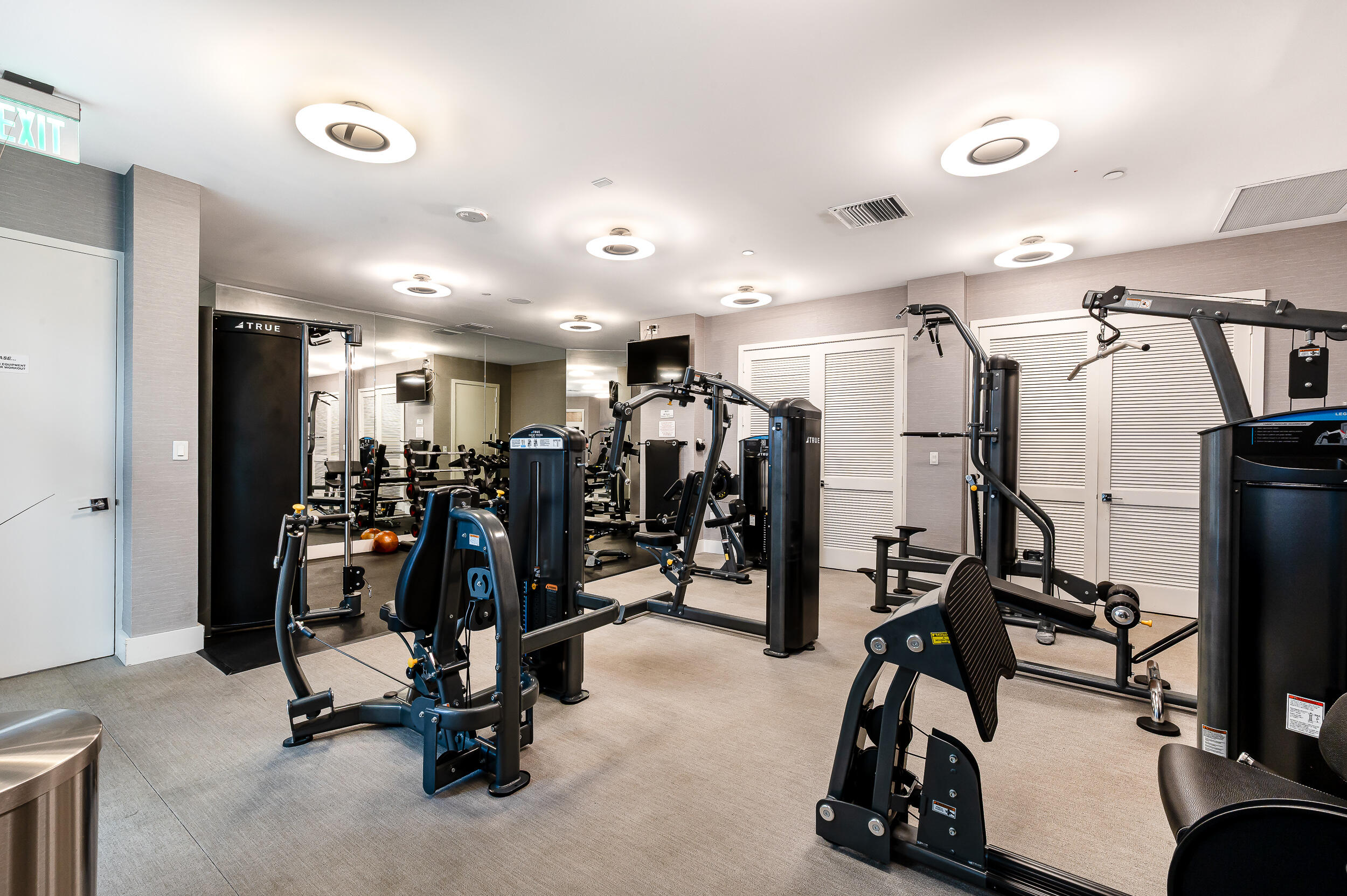 300 Southeast 5th Avenue, Unit 6110 Boca Raton, FL 33432 - Photo 58 of 96 a view of a room with gym equipment