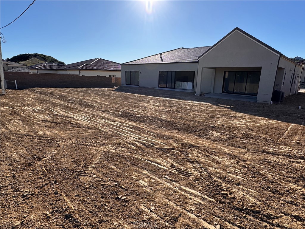 11900 Red Hawk Lane Porter Ranch, CA 91326 - Photo 23 of 26 Rear Elevation: Saddleback Modern Farmhouse - Ridge Collection at Bella Vista - Homesite 72 - Home is still under construction