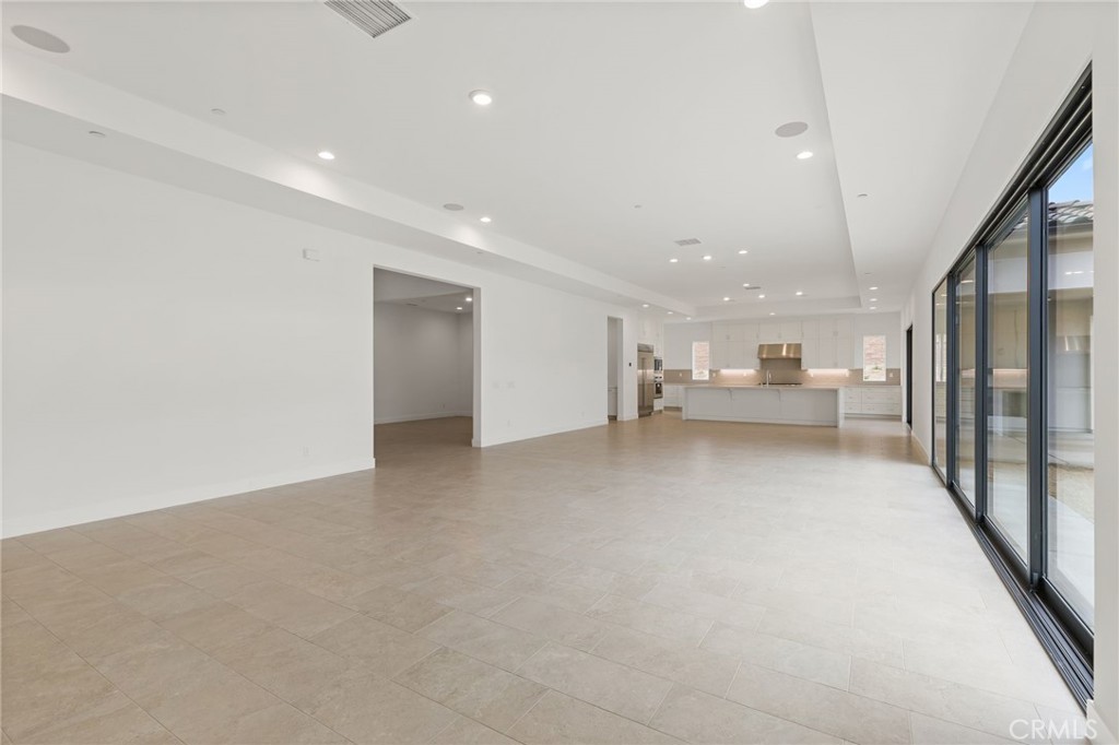 11900 Red Hawk Lane Porter Ranch, CA 91326 - Photo 3 of 26 Great Room: Saddleback Modern Farmhouse - Ridge Collection at Bella Vista - Photo of another Saddleback - Not actual home for sale - Home is still under construction