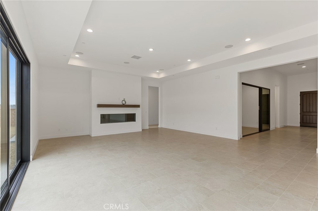 11900 Red Hawk Lane Porter Ranch, CA 91326 - Photo 4 of 26 Living Room: Saddleback Modern Farmhouse - Ridge Collection at Bella Vista - Photo of another Saddleback - Not actual home for sale - Home is still under construction
