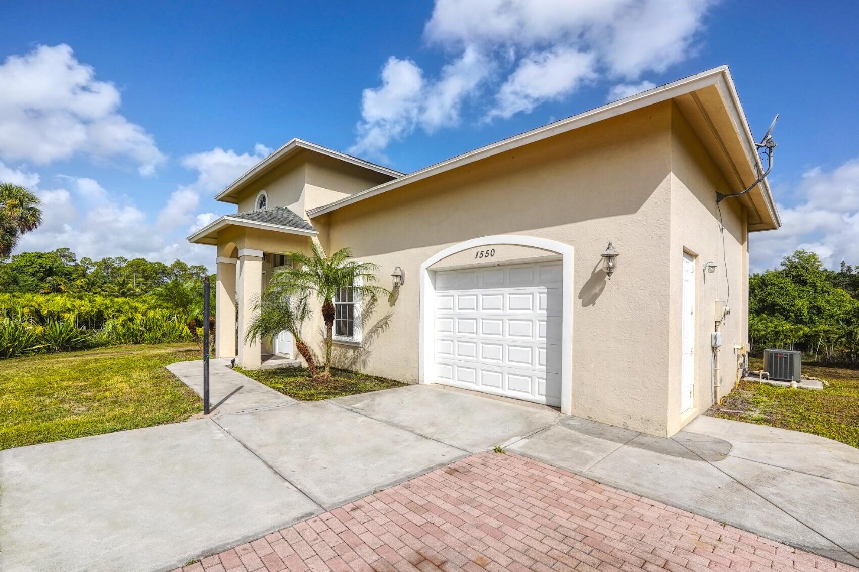 1550 C Road Loxahatchee Groves, FL 33470 - Photo 16 of 23 1550 C Rd front of home 3
