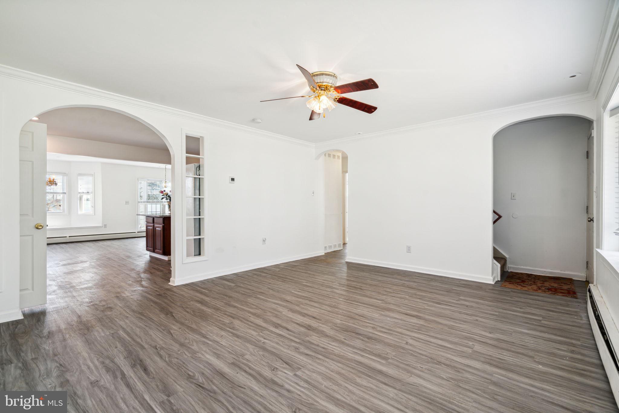 4 Long Loop Road Levittown, PA 19056 - Photo 5 of 32 Living room looking into kitchen/dining room