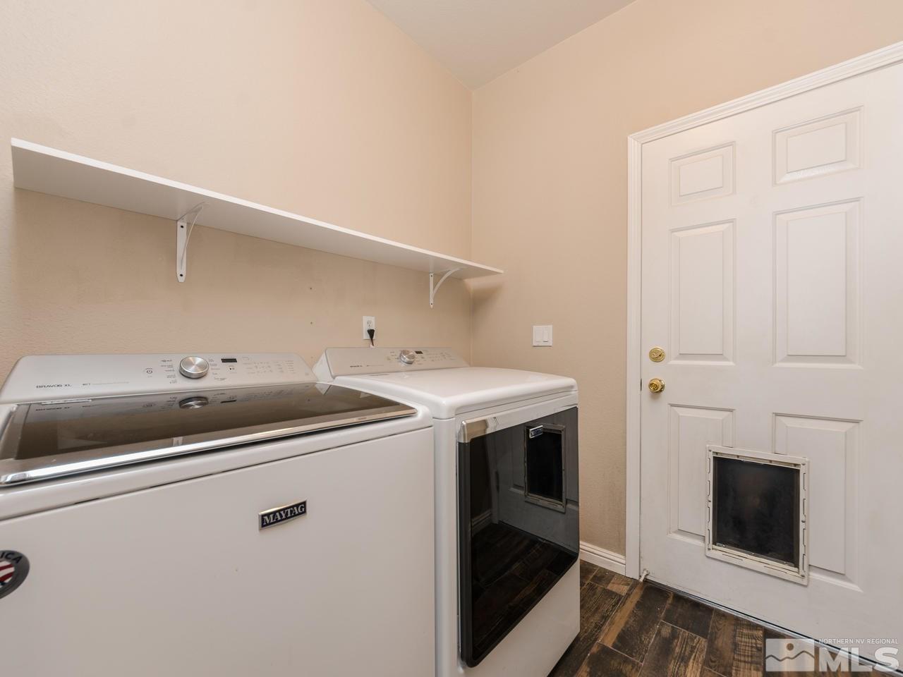 10592 Iron Point Circle Reno, NV 89521 - Photo 11 of 20 a utility room with dryer and washer