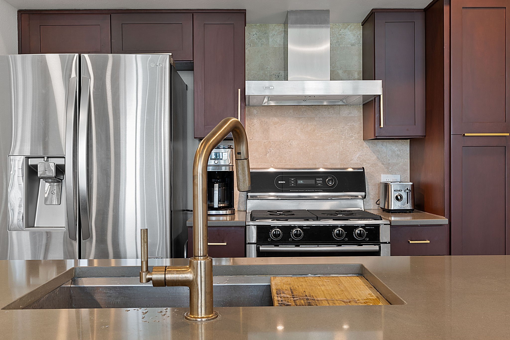 1600 Barton Springs Road, Unit 2102 Austin, TX 78704 - Photo 10 of 37 a kitchen with stainless steel appliances granite countertop a refrigerator and a stove