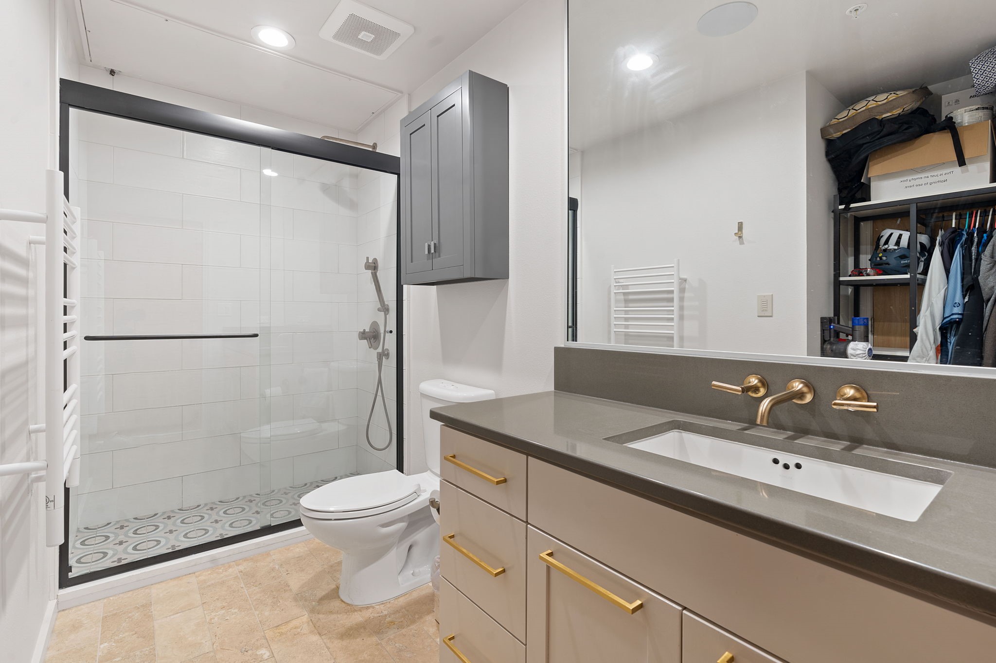 1600 Barton Springs Road, Unit 2102 Austin, TX 78704 - Photo 18 of 37 a bathroom with a sink toilet and shower