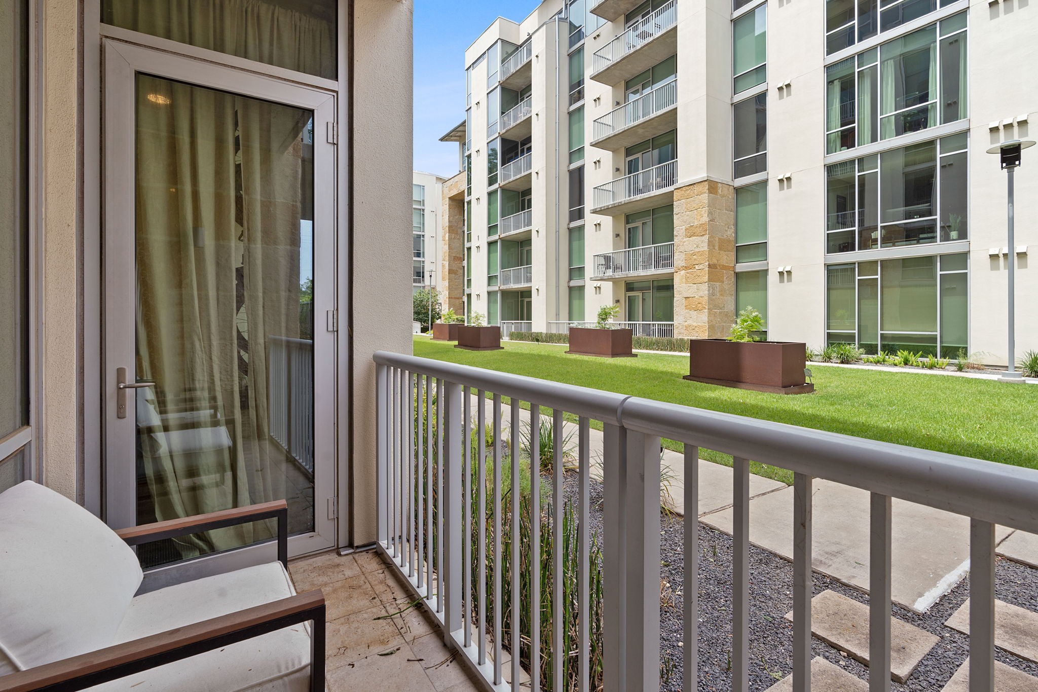 1600 Barton Springs Road, Unit 2102 Austin, TX 78704 - Photo 21 of 37 a front view of a building from a window