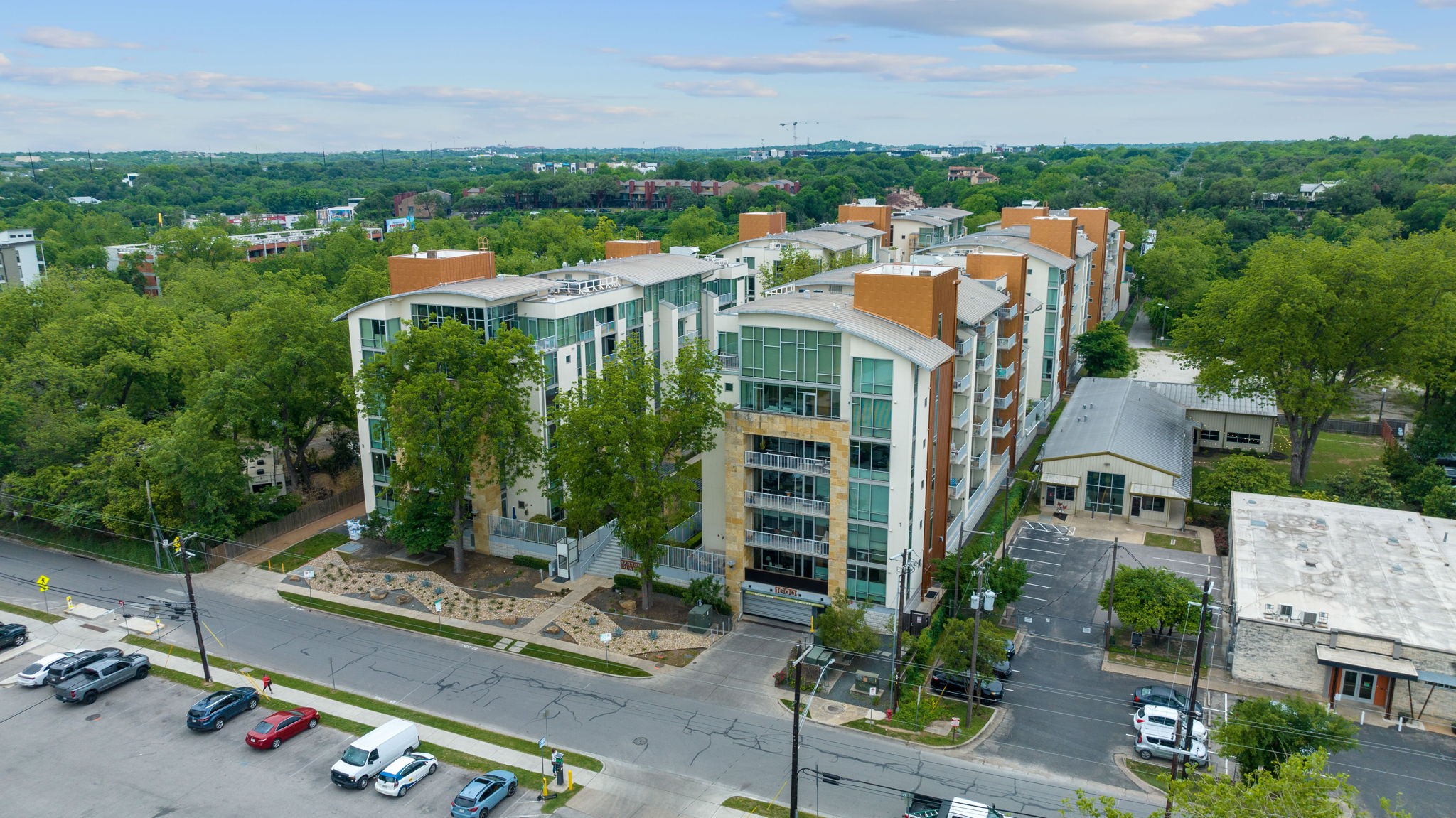 1600 Barton Springs Road, Unit 2102 Austin, TX 78704 - Photo 36 of 37 an aerial view of residential house with outdoor space and seating area