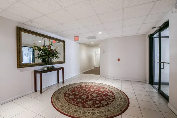 a view of a hallway with a large window