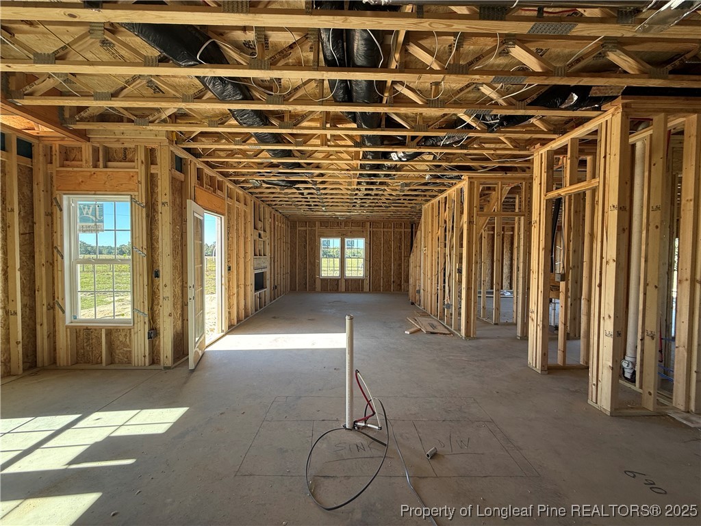 2070 Canady Pond Road Hope Mills, NC 28348 - Photo 2 of 6 a view of a hallway with wooden walls