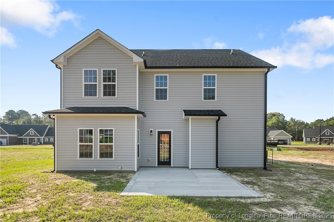 2070 Canady Pond Road Hope Mills, NC 28348 - Photo 5 of 6 a front view of a house with a yard