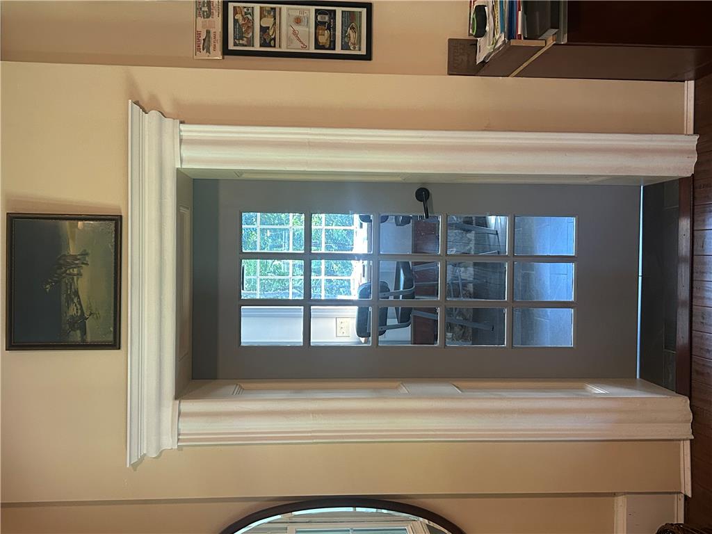 7 Allegheny Road Mount Bethel, PA 18343 - Photo 38 of 71 Classic millwork frames a handsome multi-pane glass door leading to an adjacent room.