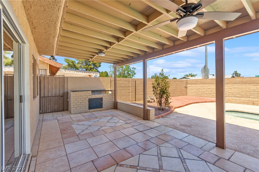 4430 Cranbrook Way Las Vegas, NV 89103 - Photo 21 of 50 A spacious covered patio with built-in barbecue offers an ideal setting for outdoor entertaining.