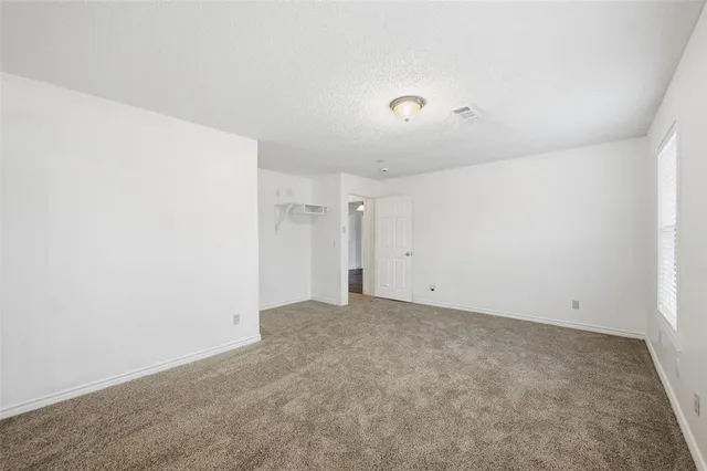 an empty room with an entryway