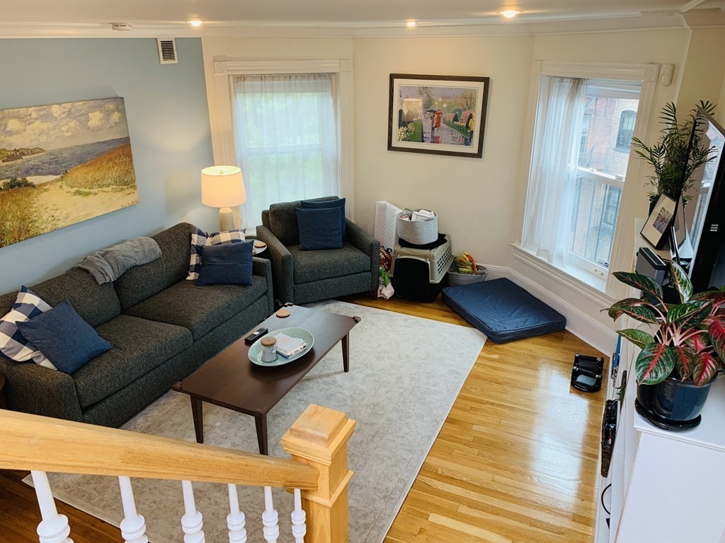 395 Marlborough Street, Unit 8 Boston, MA 02115 - Photo 15 of 19 a living room with furniture and a rug