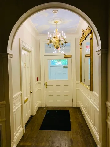 a bathroom with a tub and a shower