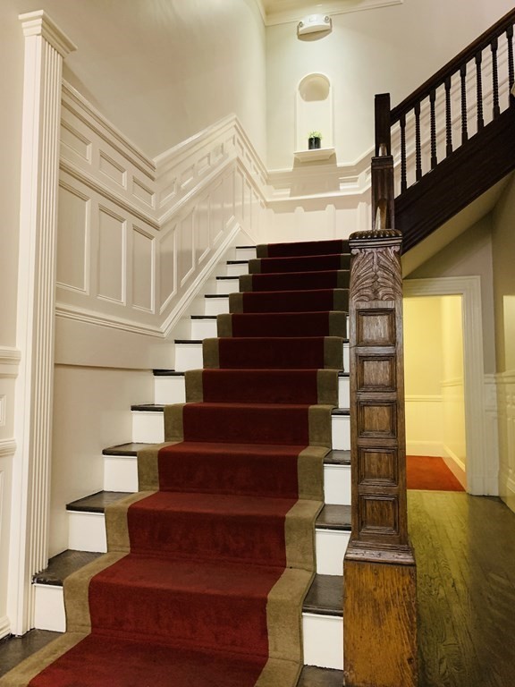 395 Marlborough Street, Unit 8 Boston, MA 02115 - Photo 4 of 19 a view of entryway and hall with wooden floor