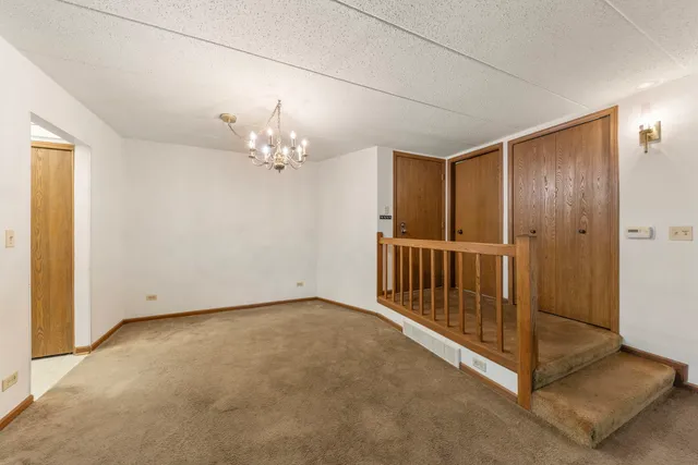 a kitchen with stainless steel appliances granite countertop a stove a sink dishwasher and a stove top oven