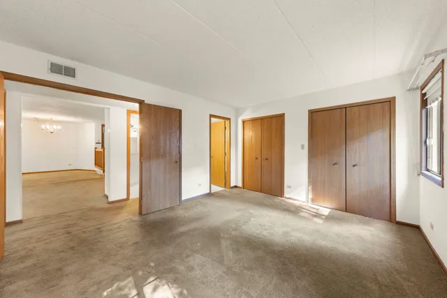 a view of an empty room with window