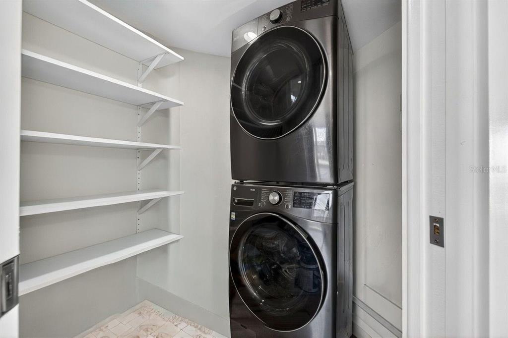 690 Island Way, Unit 1109 Clearwater Beach, FL 33767 - Photo 23 of 37 a close up view of a washer and dryer