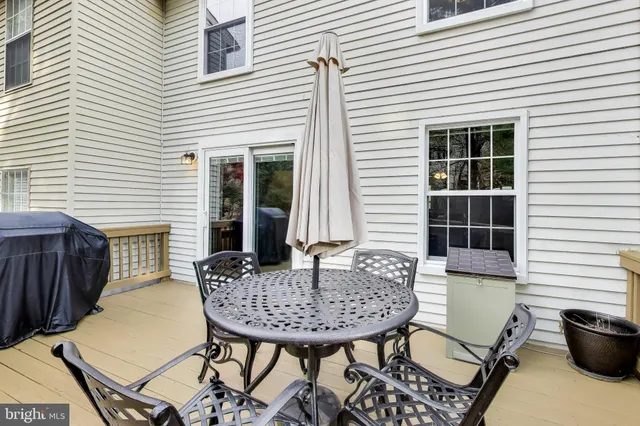 a view of a patio with furniture