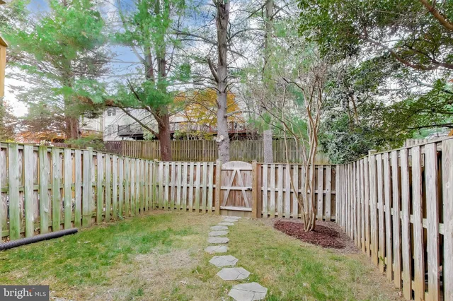 a view of a wooden fence
