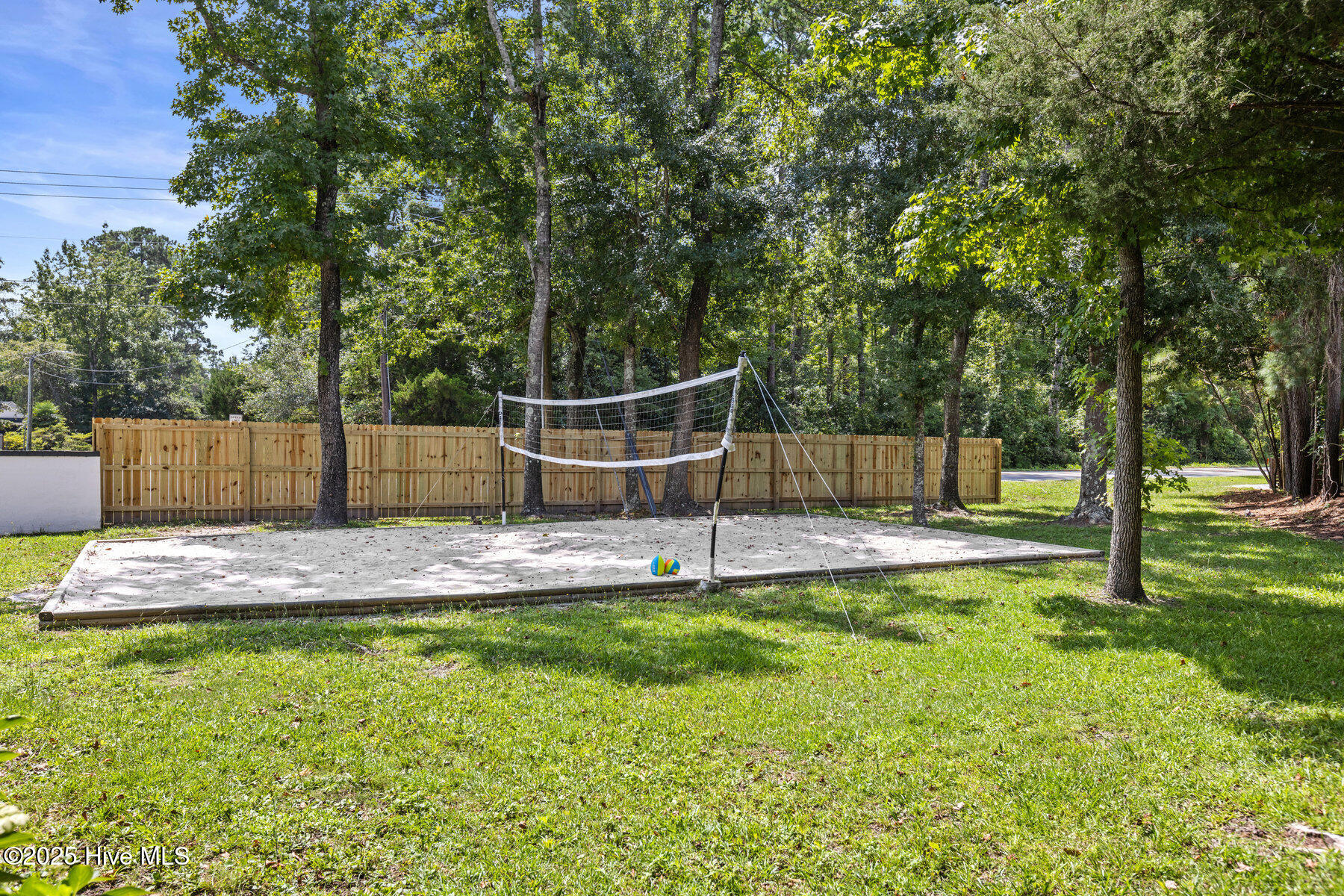 6101 Greenville Loop Road Wilmington, NC 28409 - Photo 34 of 37 Yard is fully fenced enclosing volley court